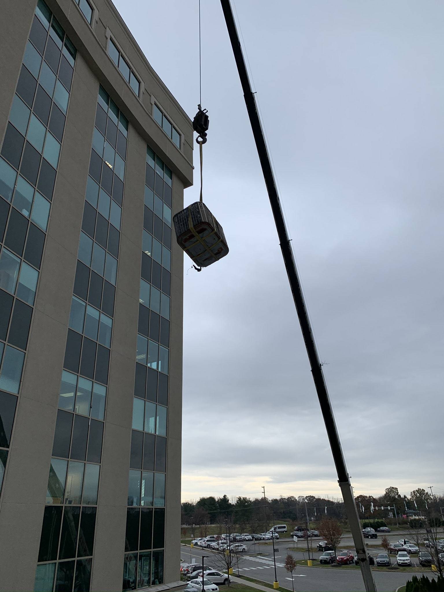 The product is lifted up using a crane